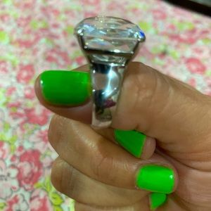 Swarovski ring fits like a 6 1/2 or 7